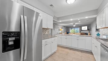 Condo, 2 Bedrooms | Private kitchen | Fridge, oven, coffee/tea maker, toaster