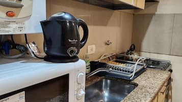 Apartment | Private kitchen | Fridge, microwave, oven, rice cooker