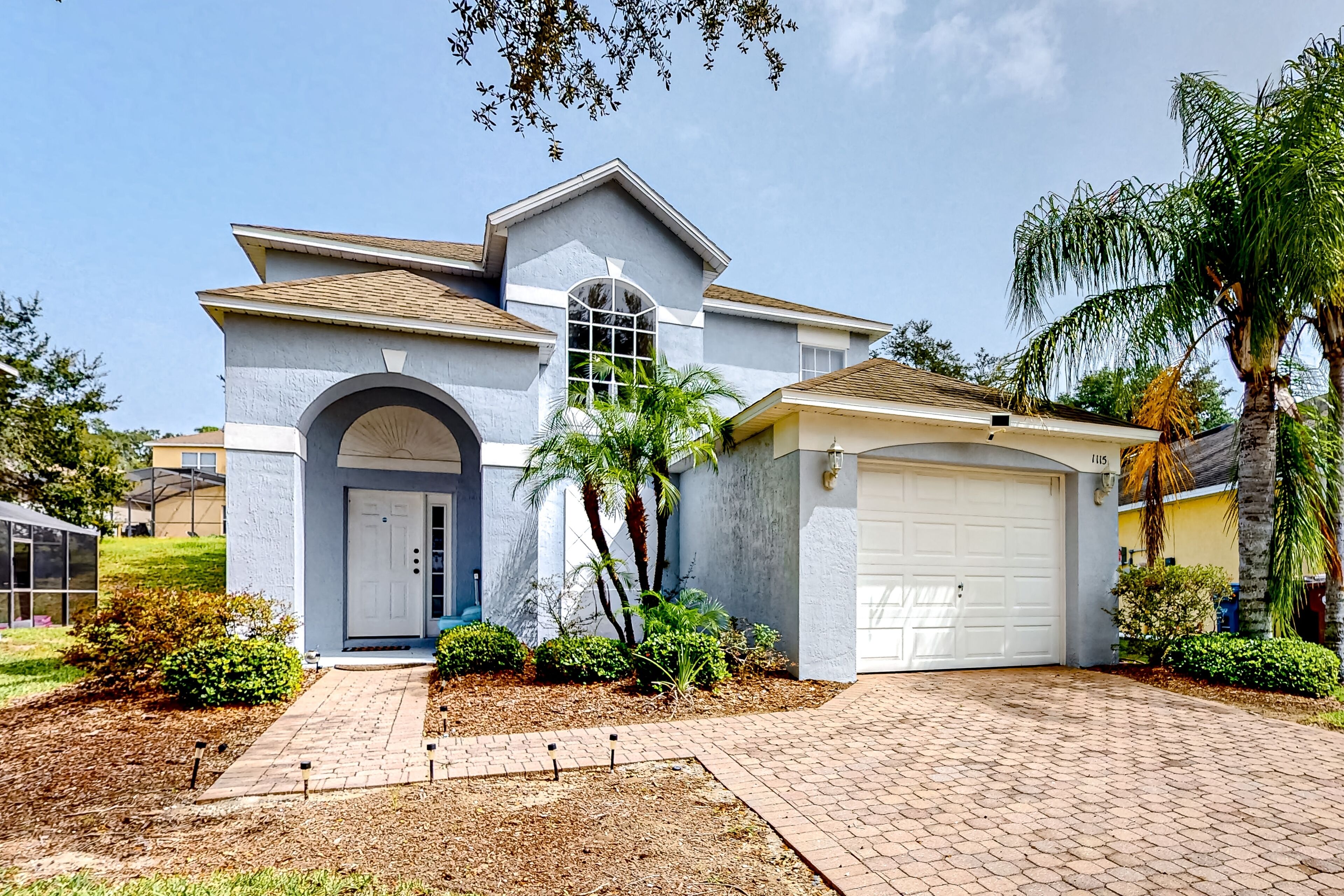 Updated home with enclosed pool, grill, children's items, central air, and W/D