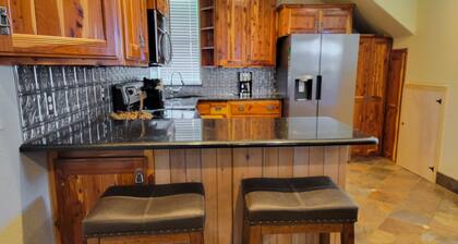 Farmhouse-style home with a balcony, gas grill, separate loft, W/D, and AC
