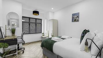 Basic Apartment, Multiple Beds | 3 bedrooms, desk, laptop workspace, iron/ironing board