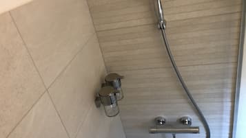Shower, towels, soap, shampoo