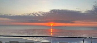 Quiet Beach Front Condo with patio overlooking Infinity Pool & Ocean