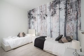 2 slaapkamers, een strijkplank/strijkijzer, gratis wifi, beddengoed