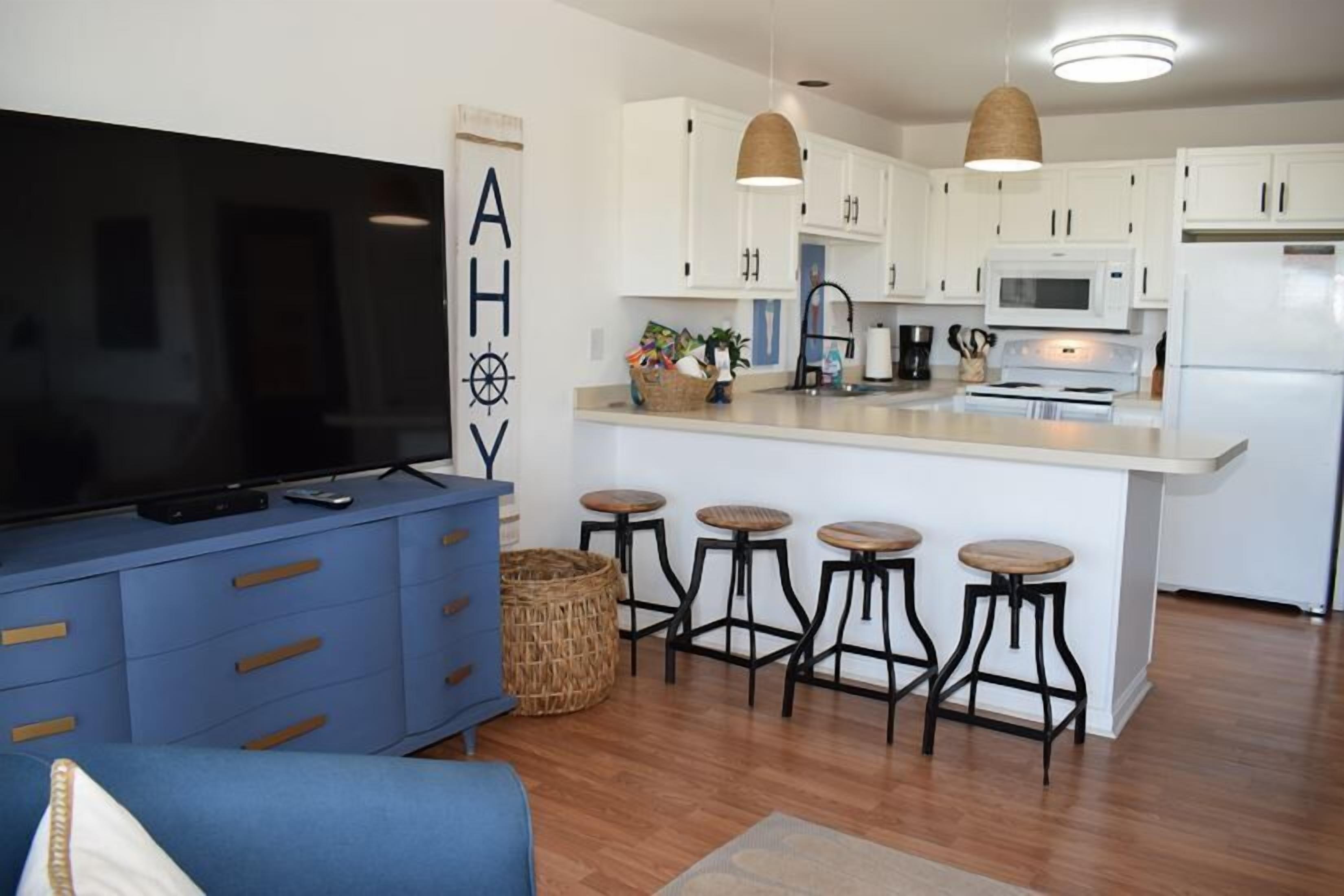 Coffee/tea maker, fridge, microwave, oven