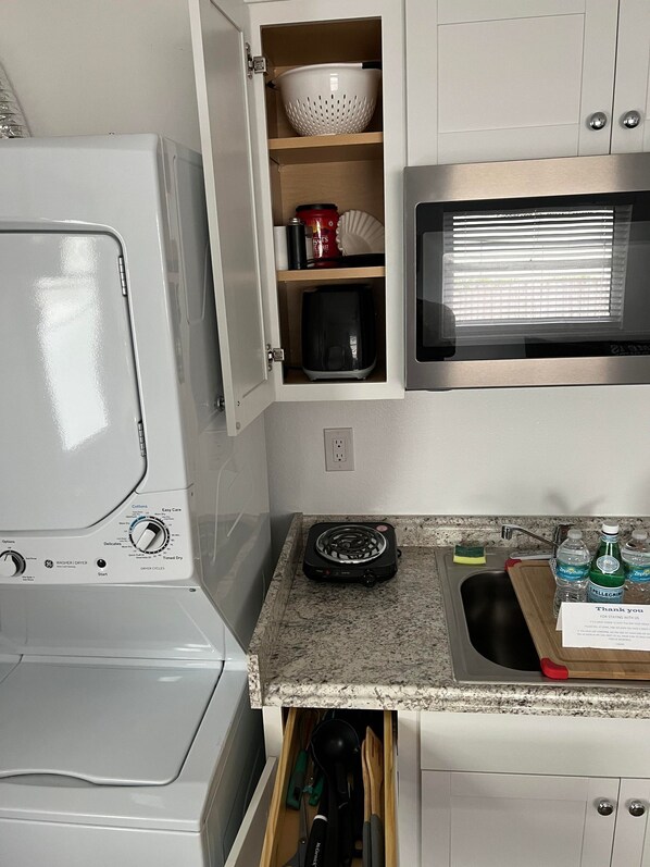 Fridge, microwave, stovetop, coffee/tea maker
