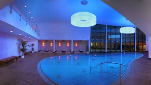 Indoor pool, open 7:00 AM to 10:00 PM, pool umbrellas, pool loungers
