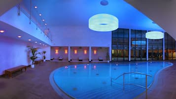 Indoor pool, open 7:00 AM to 10:00 PM, pool umbrellas, sun loungers