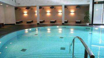 Indoor pool, open 7:00 AM to 10:00 PM, pool umbrellas, sun loungers