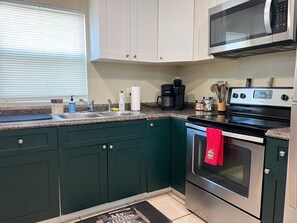 Fridge, microwave, oven, stovetop - Sunny Fort Myers Retreat: Pet-Friendly near Downtown District, No Cleaning Fee! (Fort Myers)