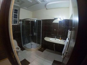Standard Room | Bathroom | Slippers - Harveys Guest House (Islamabad)