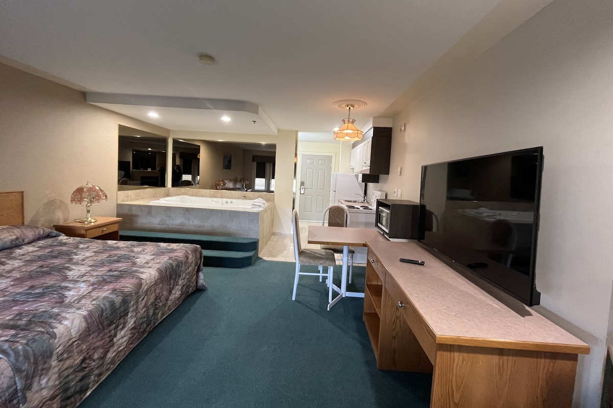 Deluxe studio suite, 1 kingsize bed, bubbelbad | Gratis wifi, beddengoed