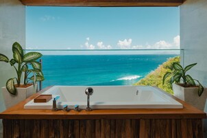 Four-bedroom Cliff Front Private Pool Villa | Bathroom | Separate tub and shower, rainfall showerhead, free toiletries