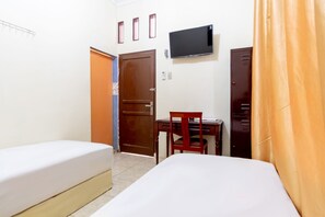 Habitación Deluxe doble | Espacio para trabajar con un portátil, wifi gratis, ropa de cama