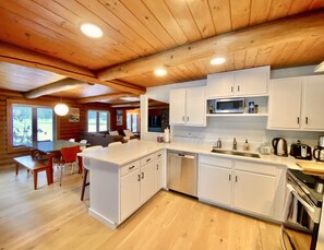 Fridge, microwave, oven, stovetop - Lakefront cabin with dock, hot tub, fire pit!! (Plymouth)