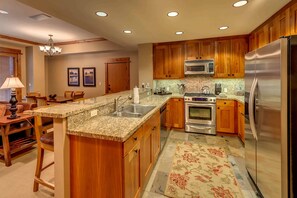 Microwave, stovetop, dishwasher, coffee/tea maker