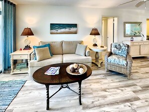 Studio, Multiple Beds, Balcony, Beach View | Living area | TV - Island Reef 304 by Distinctive Beach Rentals (Fort Myers Beach)