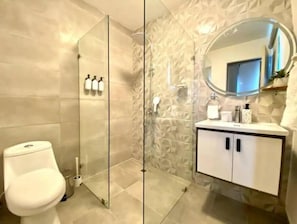 Shower, hair dryer, towels, soap