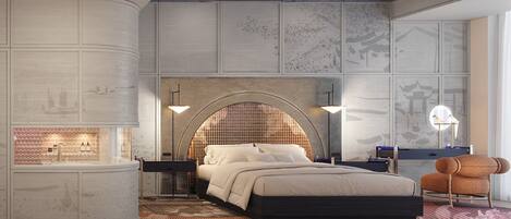 A modern bedroom with a large bed, a curved headboard, and a built-in vanity.