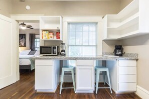 2 bedrooms, desk, iron/ironing board, travel crib