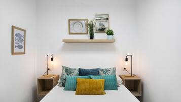 2 dormitorios, tabla de planchar con plancha, wifi gratis y ropa de cama