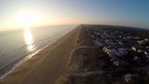 An aerial view of a coastal area with a beach and a residential area. - Fairbanks House with beach access just steps from your front door (Virginia Beach)