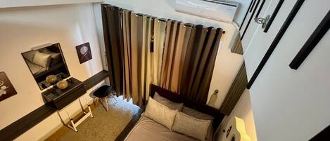 Standard Condo, 1 Bedroom, Non Smoking, City View | 1 bedroom, down duvets, pillow-top beds, minibar