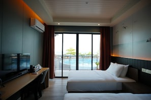 Deluxe Twin kamer | Een kluis op de kamer, verduisterende gordijnen, gratis wifi, beddengoed