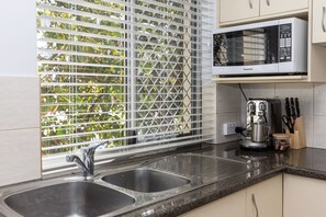 Fridge, microwave, oven, stovetop - Totally Beachin' Fantastic 2 bed apartment in the middle of it all! (YAMBA)