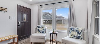 Inviting house with large enclosed yard, central AC, washer/dryer, & golf nearby