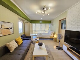 Basic Condo | Desk, laptop workspace, free WiFi, bed sheets