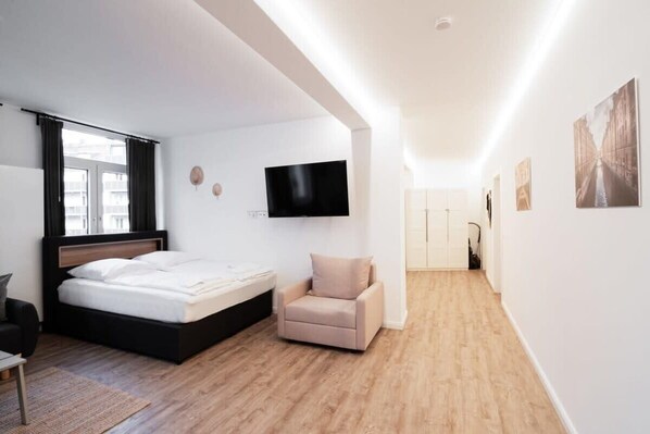 2 habitaciones, tabla de planchar con plancha, wifi y ropa de cama 