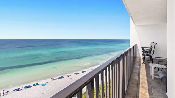 A balcony with a view of a beach and the ocean. - One Seagrove Place 1201 (Santa Rosa Beach)