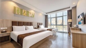 A hotel room with two beds, a desk, and a large window with a city view. - Tingyue Yiju Hotel (Shanghai)