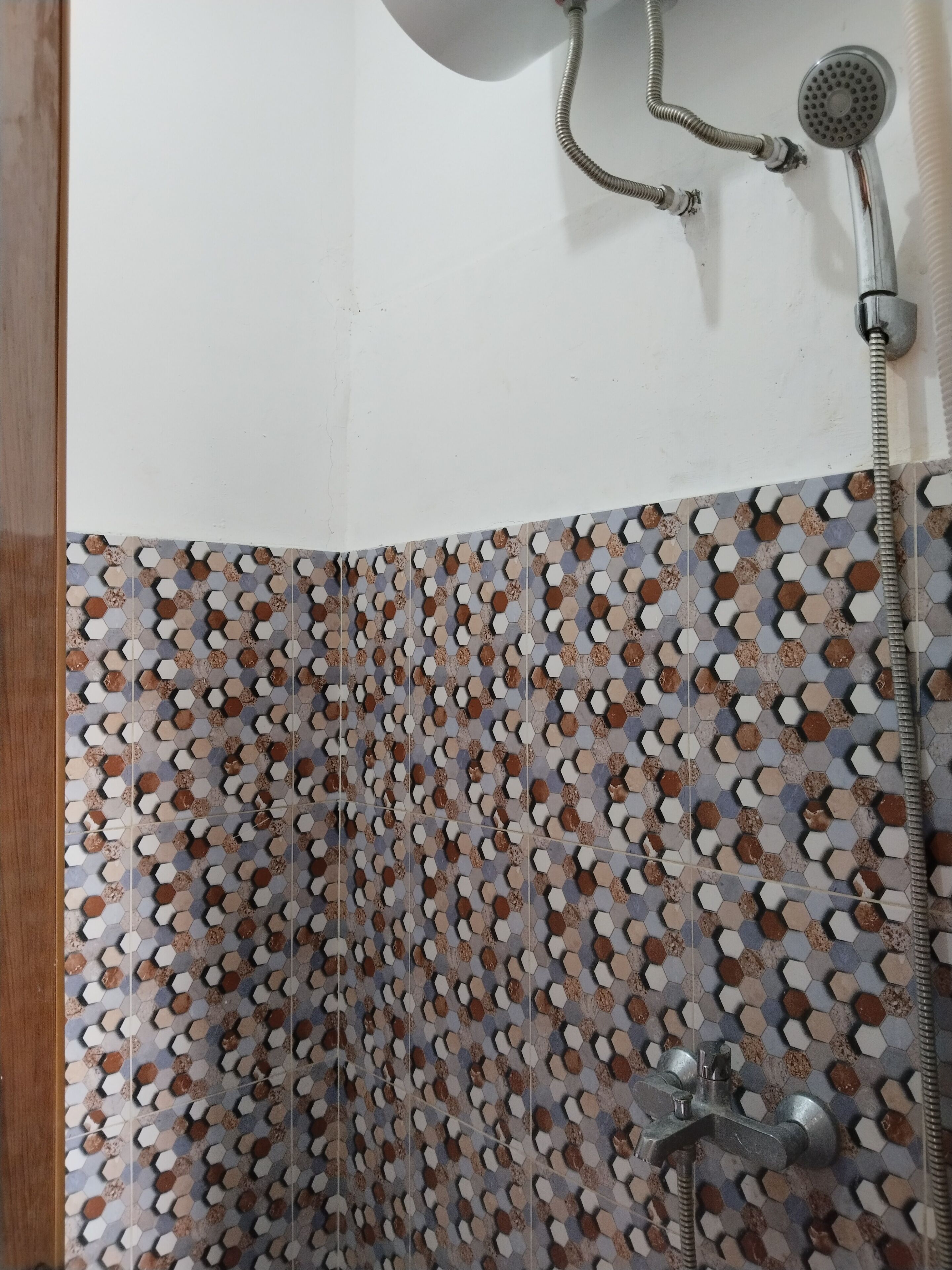 standard double room | bathroom | shower, rainfall showerhead, towels, toilet paper