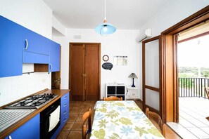 Fridge, oven, dining tables