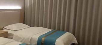 Qiemo Tazhong Town Moqin Jiayuan Express Hotel