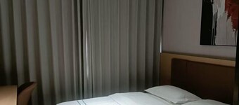 Qiemo Tazhong Town Moqin Jiayuan Express Hotel