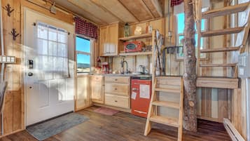 Mini-fridge, microwave, toaster, cookware/dishes/utensils