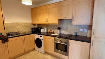 One Bedroom Apartment | Private kitchen | Electric kettle, toaster