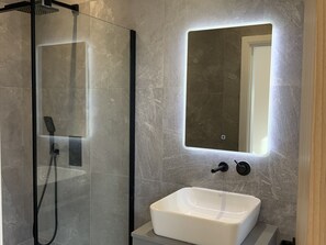 Hair dryer, towels, soap, toilet paper