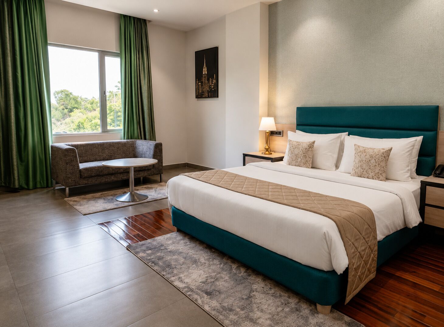 A hotel room with a bed, a chair, a nightstand, a lamp, and a window with curtains.