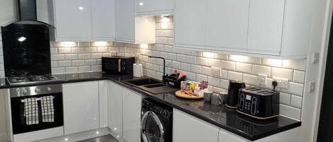 Apartment | Private kitchen | Fridge, microwave, oven, stovetop