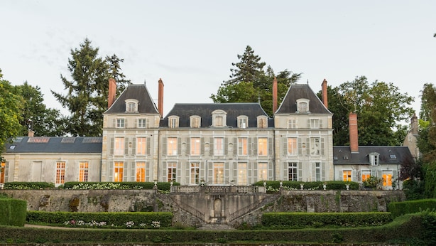 A large, historic building with multiple windows and a central entrance. - Château du Rondon (Olivet)