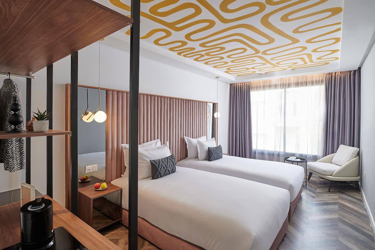 Deluxe Twin Room | 1 bedroom, premium bedding, in-room safe, iron/ironing board