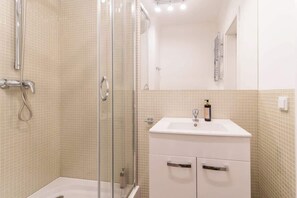 Shower, hair dryer, shampoo