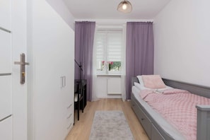 1 habitación, tabla de planchar con plancha, wifi y ropa de cama 