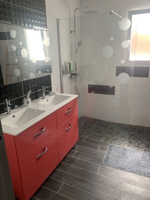 Shower, hair dryer, towels, soap