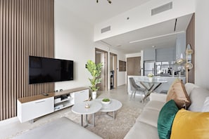 Deluxe Apartment | Living area - WelHome - Contemporary 1BR in Binghatti Canal & Burj Views (Dubai)