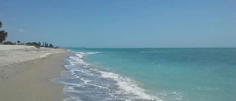 On the beach, sun-loungers, beach towels